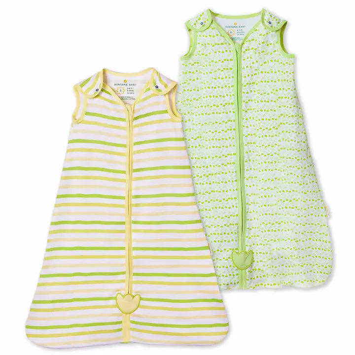 Two Nintara Baby sleep bags, Citrus Stripes in lime green and yellow horizontal stripes, and Forest Flutter in lime green dot and dash print, both with front zippers and tulip appliqués.