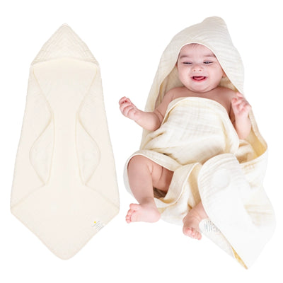 Baby wrapped in a hooded muslin cotton bath towel designed for gentle drying after bath time. The soft, breathable fabric keeps baby warm and comfortable while the hood helps dry the head quickly. Large absorbent towel designed to wrap newborns and infants securely for cozy post-bath care.