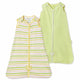 Two Nintara Baby sleep bags, size S. Citrus Stripes in lime green and yellow horizontal stripes, and Soft Sage in solid sage green, both with front zippers and tulip appliqués at zipper base.