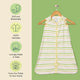 Nintara Baby sleep sack on a wooden hanger. Features icons highlighting soft and breathable fabric, GOTS certified organic cotton and sourced from field to home.