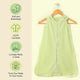 Nintara Baby sleep sack on a wooden hanger. Features icons highlighting soft and breathable fabric, GOTS certified organic cotton, lovingly made in India, and sourced from field to home.