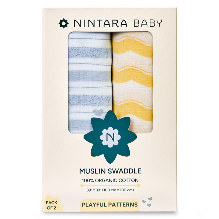 Two-pack organic cotton muslin swaddles with blue stripes and yellow wavy patterns