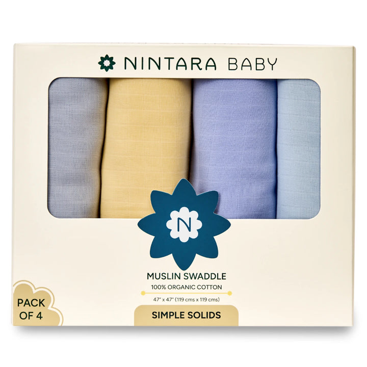 Boxed set of four organic cotton muslin baby swaddles in pastel colors for gentle comfort