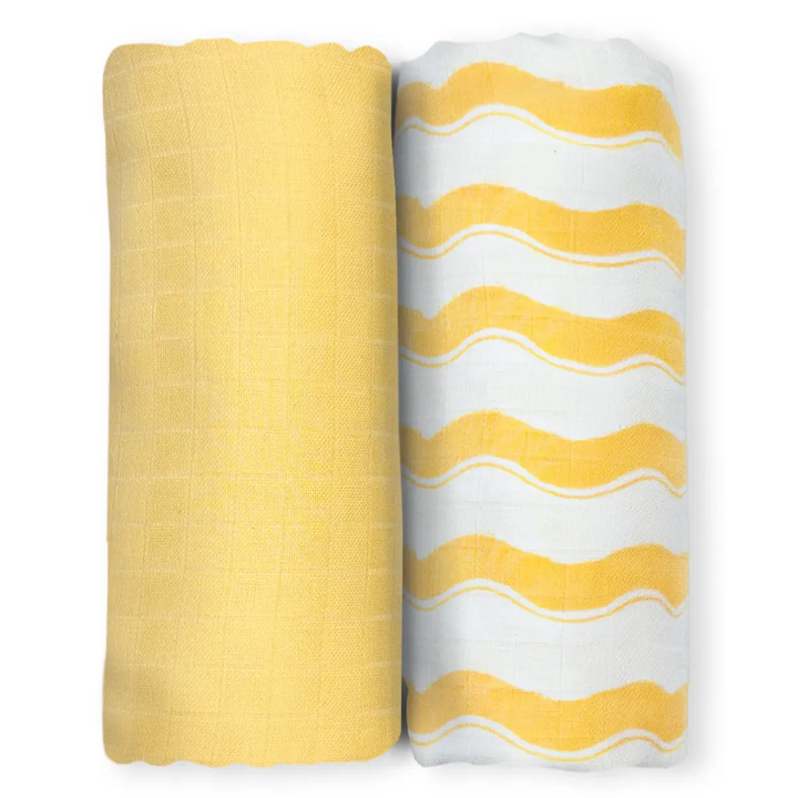 Two yellow and white patterned baby swaddle blankets from Sunshine Baby set