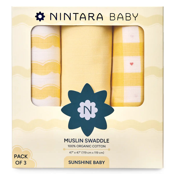 Three-pack of yellow and white patterned organic cotton muslin baby swaddles for Sunshine Baby