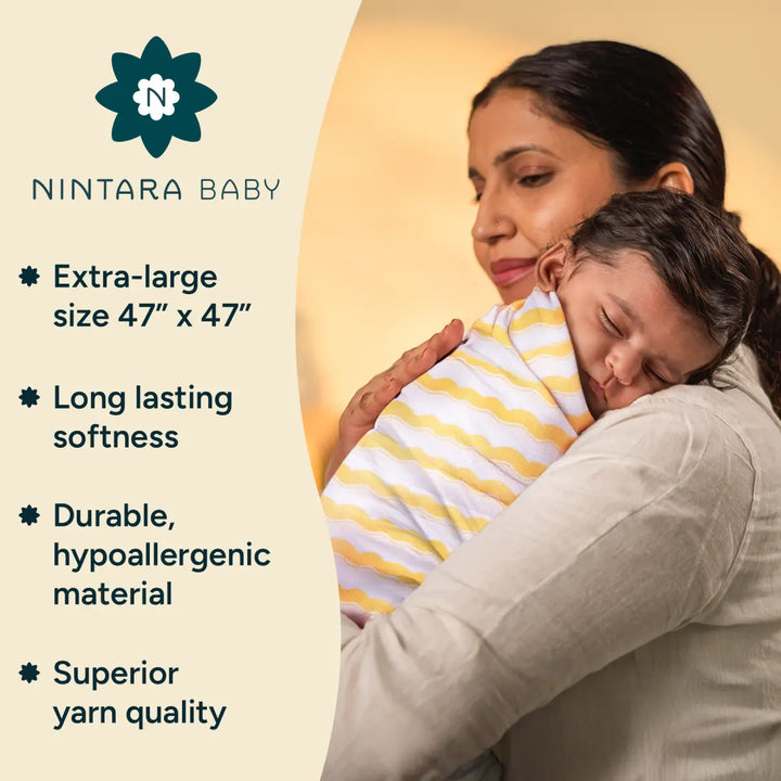 A mother lovingly holds her baby, wrapped in a striped swaddle, with the product’s key features listed beside them. The features include "Extra-large size 47” x 47,”" "Long-lasting softness," "Durable, hypoallergenic material," and "Superior yarn quality." These details highlight the swaddle’s premium quality, designed for comfort, durability, and safety. The imagery emphasizes both the product's practicality and the loving bond between mother and child.